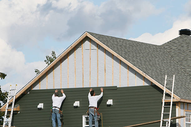Professional Vinyl Siding technician working in Timnath, CO